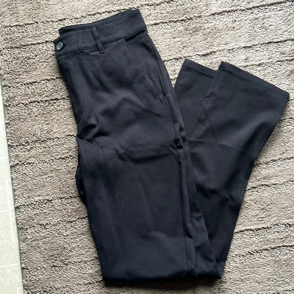 True classic men’s 4 way stretch black pant. 30” waist